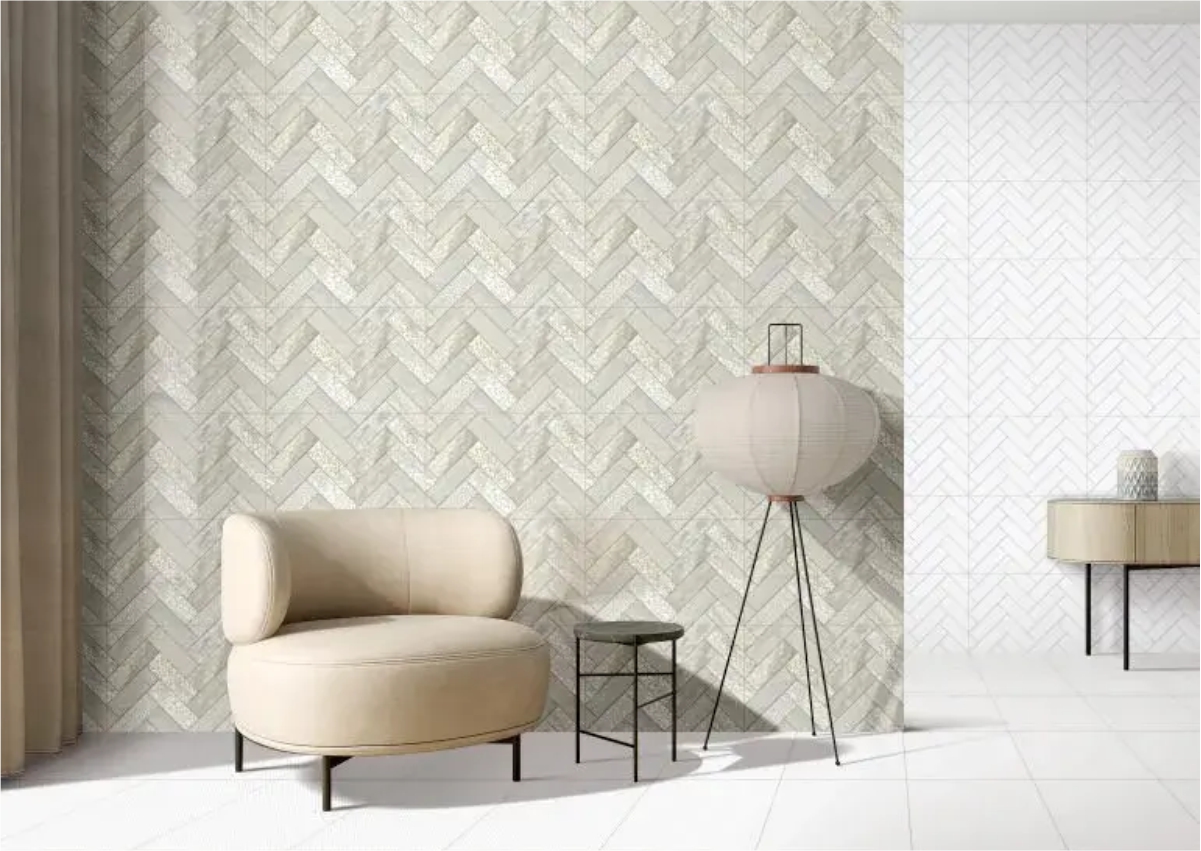Living room interior featuring Multi Flora Herringbone wall tiles with a floral herringbone pattern and glossy finish, adding vibrant color and artistic elegance to the accent wall.