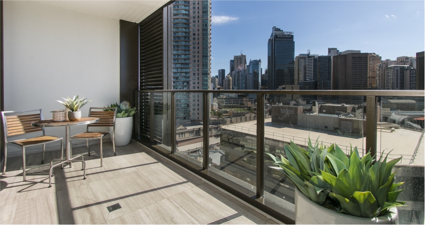 A balcony with modern grill