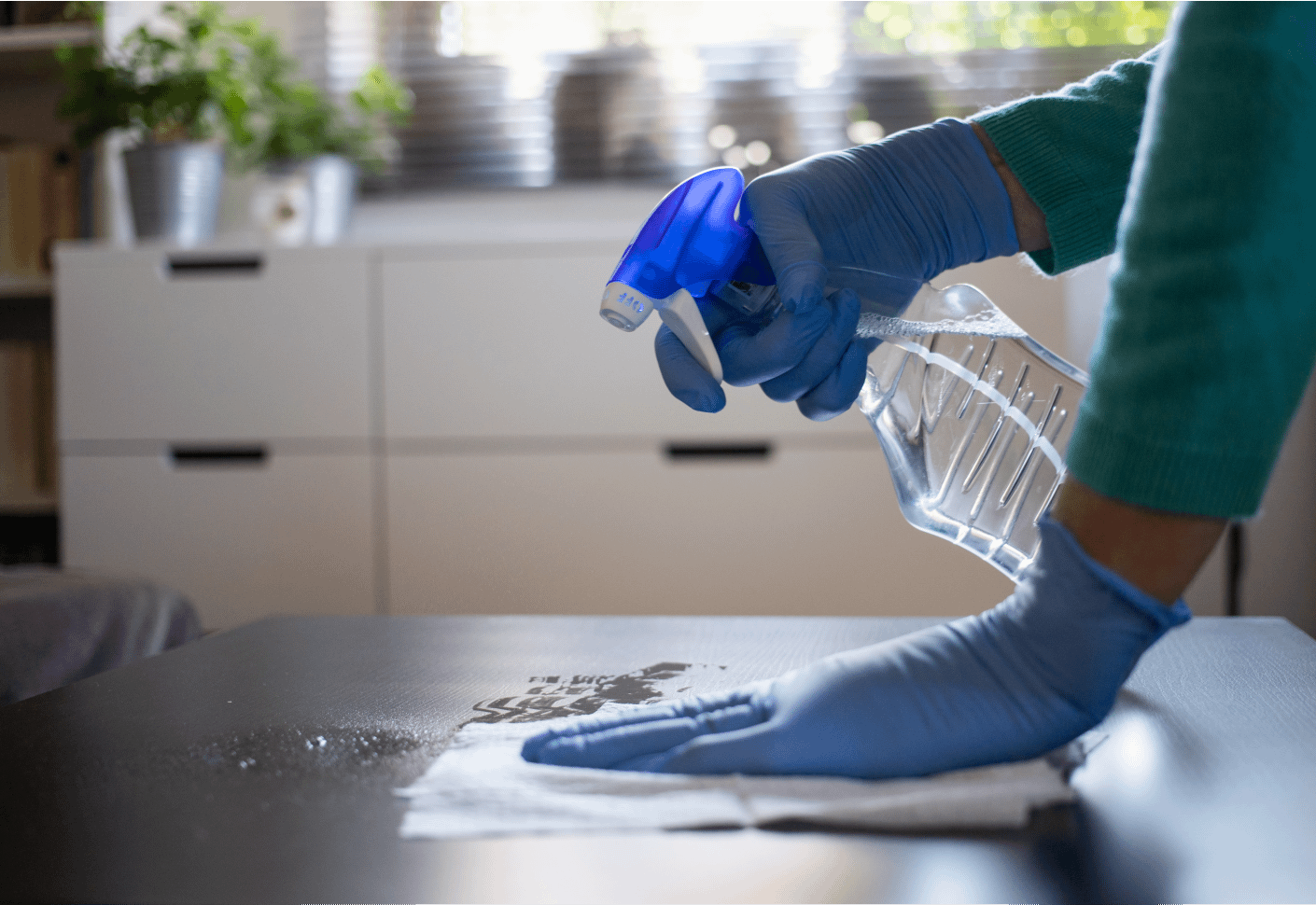 disinfecting the table surface