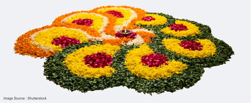 beautiful and vibrant rangoli with flower petals.