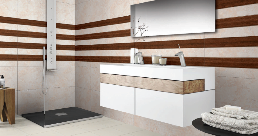 A bathroom with white and brown striped walls.