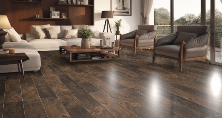 A living room with wood floors and brown furniture.