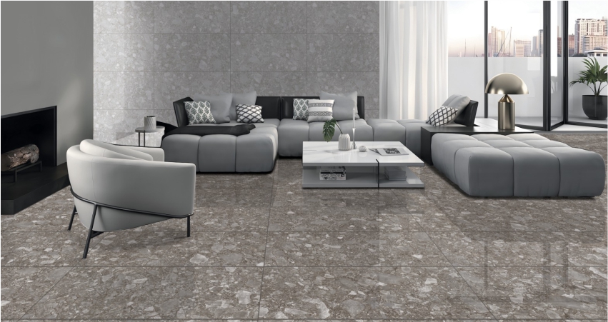 A small living room with a grey tile floor