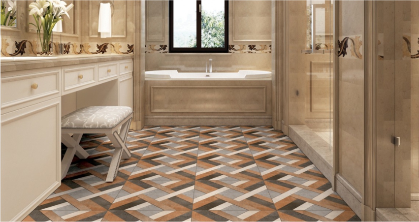 A bathroom with a beige and brown tiled floor.