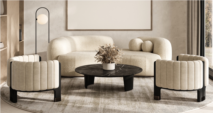 A living room with white furniture and a coffee table.