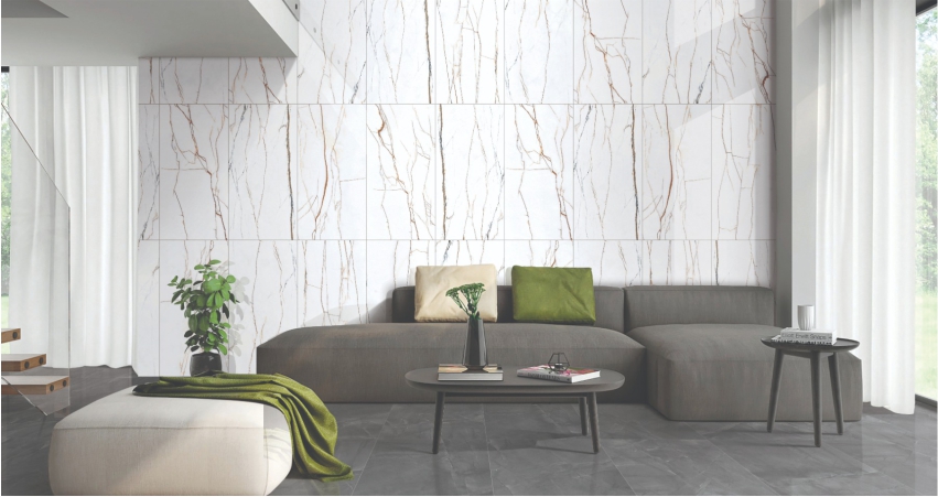 A living room with a white marble wall.