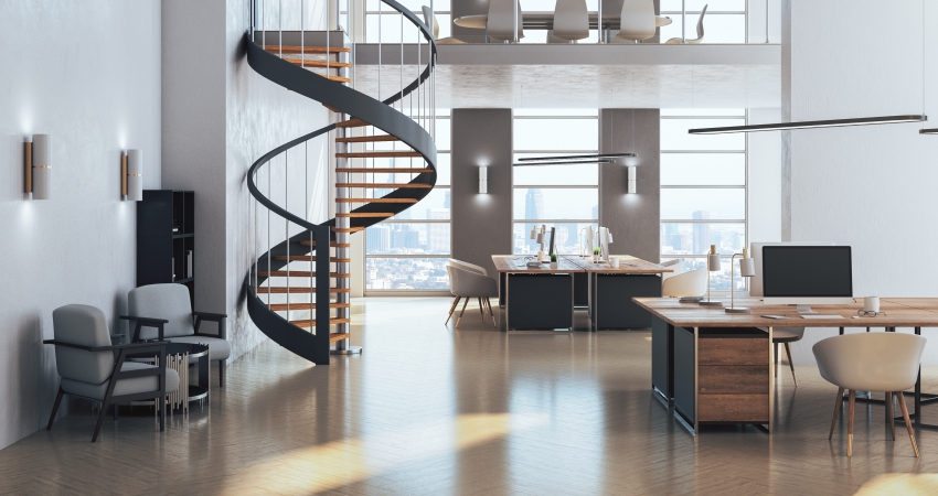 An office with a spiral staircase.