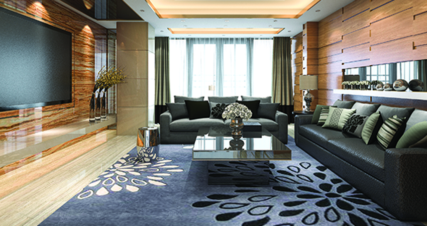 A living room with fresh ceiling and a flat screen tv.