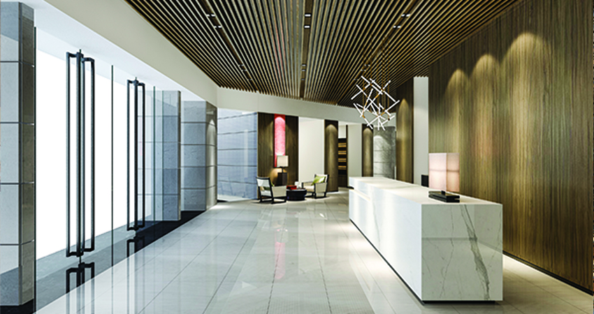 A modern lobby with a wooden ceiling.