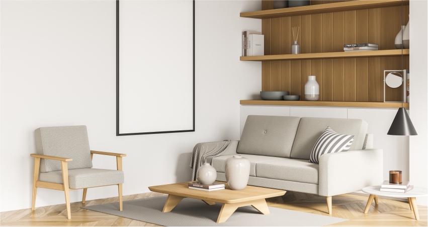 A living room with a sofa, coffee table and shelves.