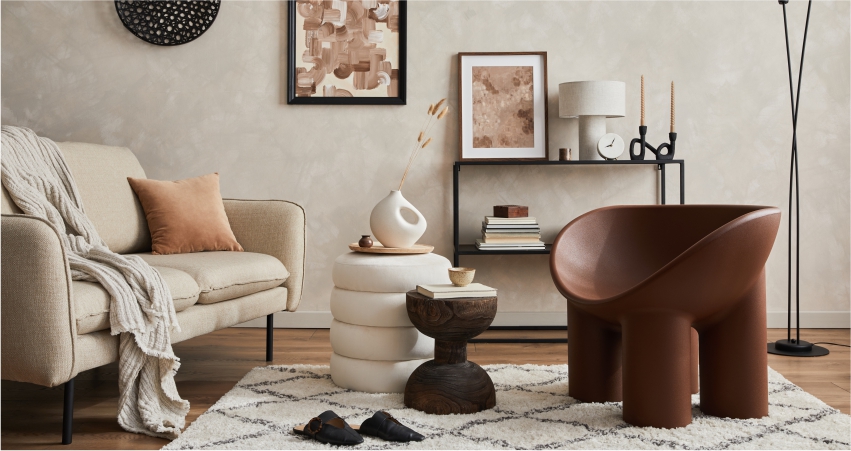 A living room with a couch and a chair.