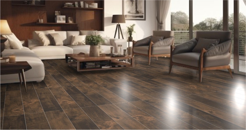 A living room with wood floors and brown furniture.