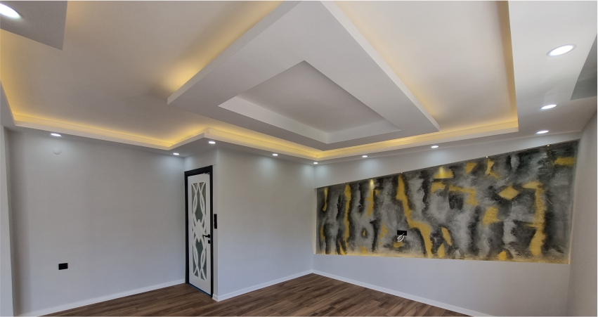 A room with a painting on the ceiling.
