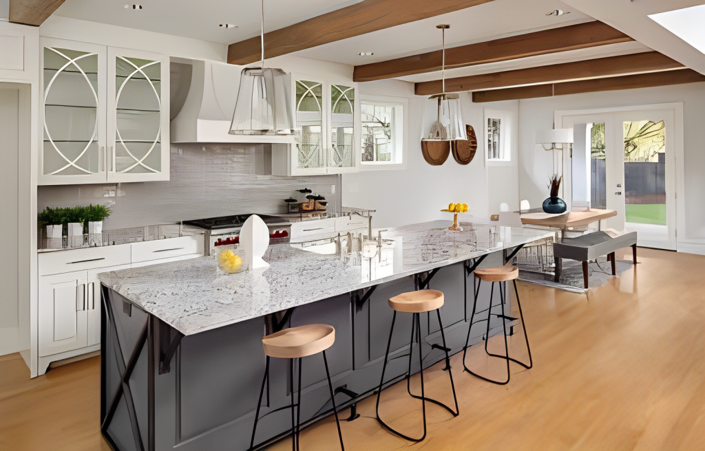 A kitchen with a large island and stools.
