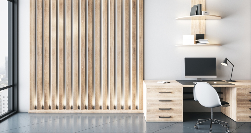 A modern office with wooden slats and a desk.