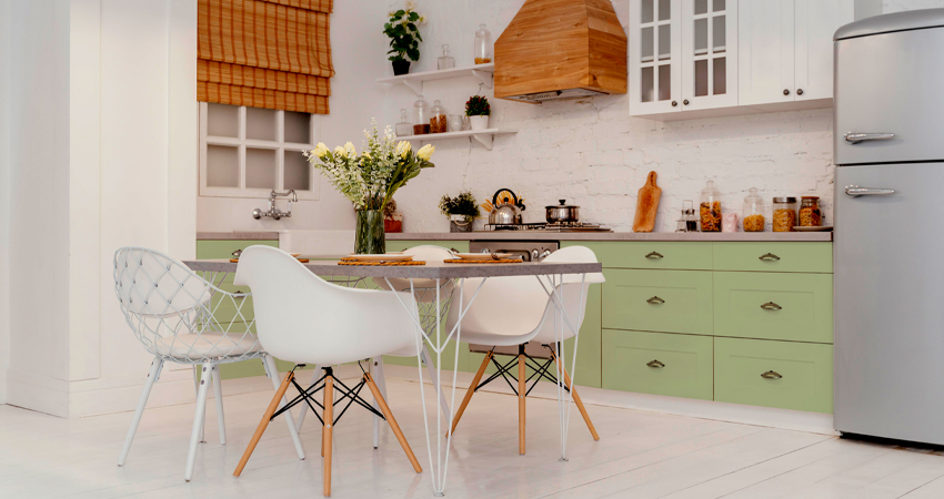 A white and green kitchen.