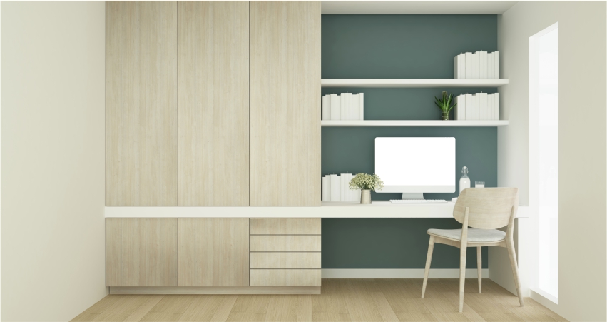 A wardrobe with a study table and bookshelves.
