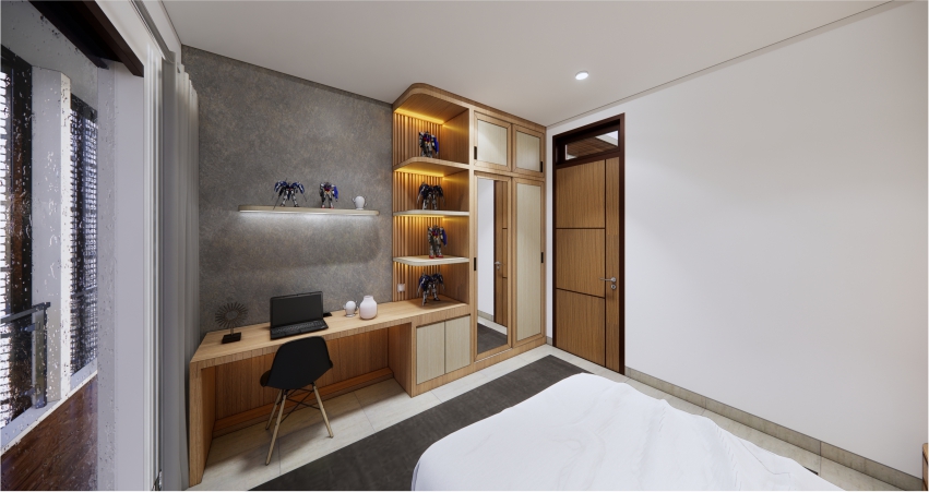 A room with a bed, desk, and cabinets.