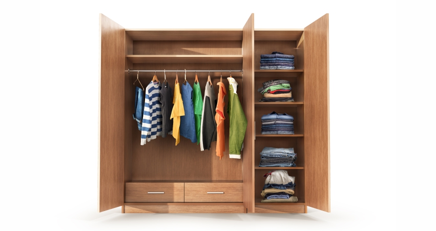 Open wooden wardrobe with neatly organized clothes hanging and folded on shelves.
