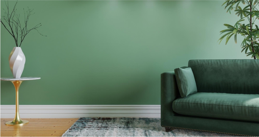 Green living room with matching sofa, ideal for a cool summer home