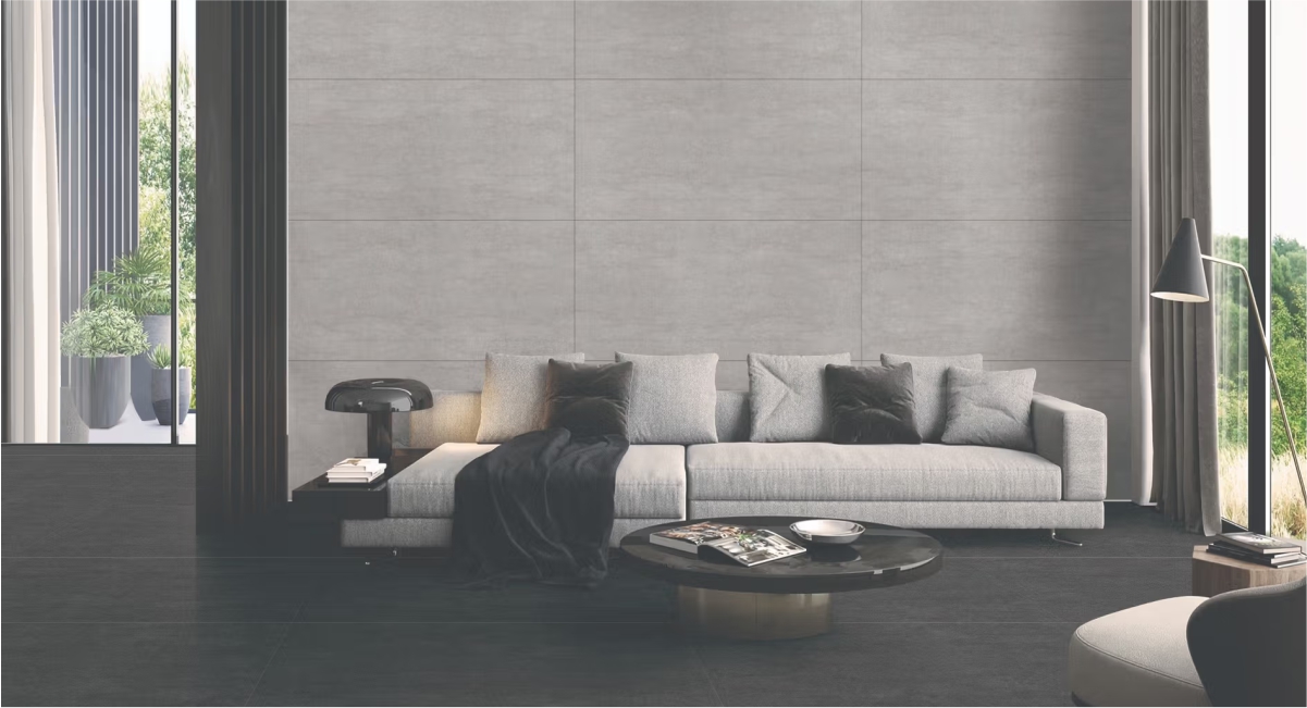 Living room with grey sandstone wall tiles and charcoal floor tiles, creating a modern and elegant contrast — perfect combination for contemporary interiors. 