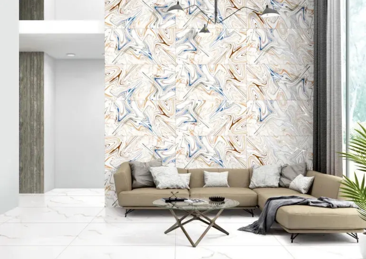 Living room interior featuring Carving Endless Statuario Gold Vein tiles on the floor with a decorative wall-tile accent wall, creating a luxurious marble-look space with elegant gold veining.
