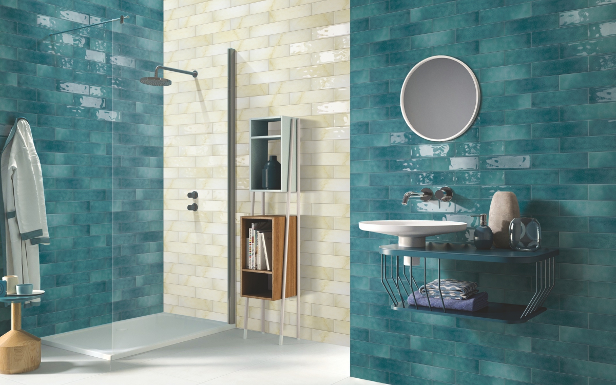 Bathroom interior featuring Teal Blue Gloss Fresco Subway wall tiles with a glossy finish, adding a vibrant, clean, and modern look to bathroom walls. 