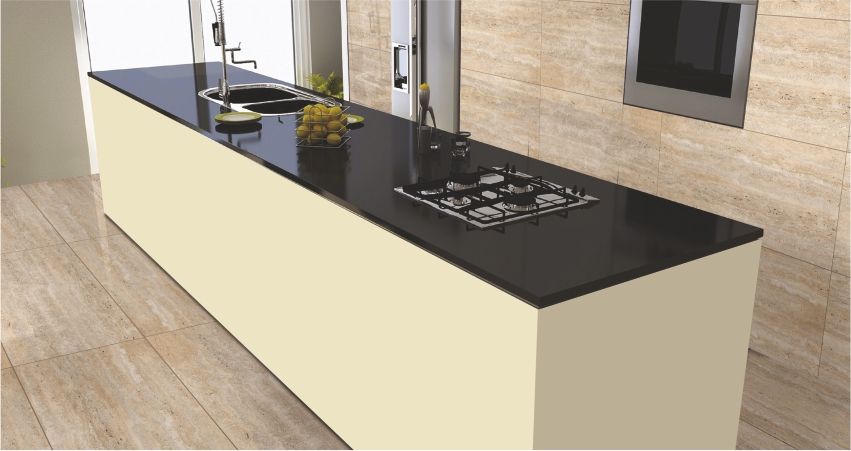 Regal kitchen countertop with glossy black Granalt Royal Black tile, paired with light decor