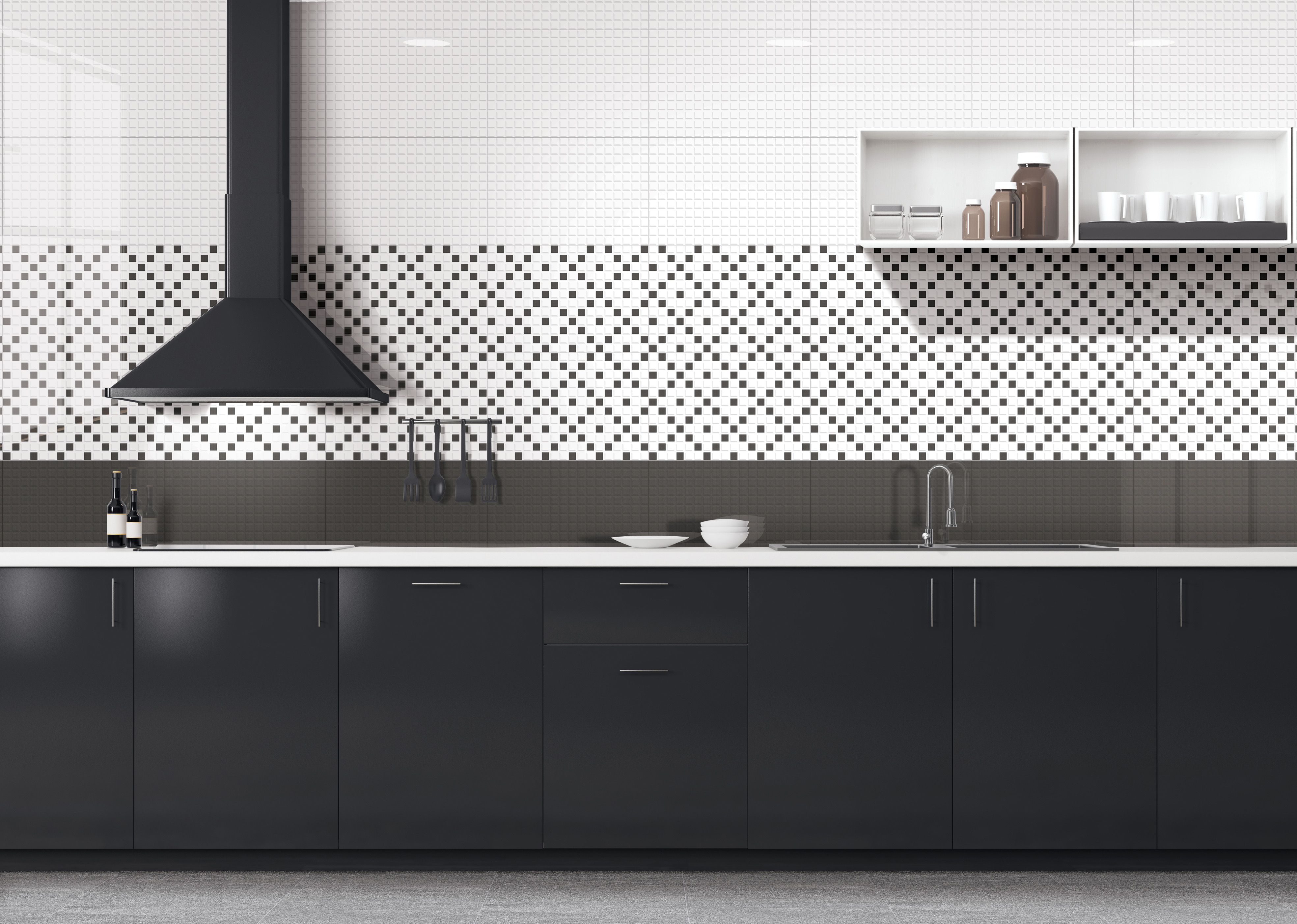 Black kitchen tiles in a mosaic pattern, adding a sleek, modern touch to the backsplash