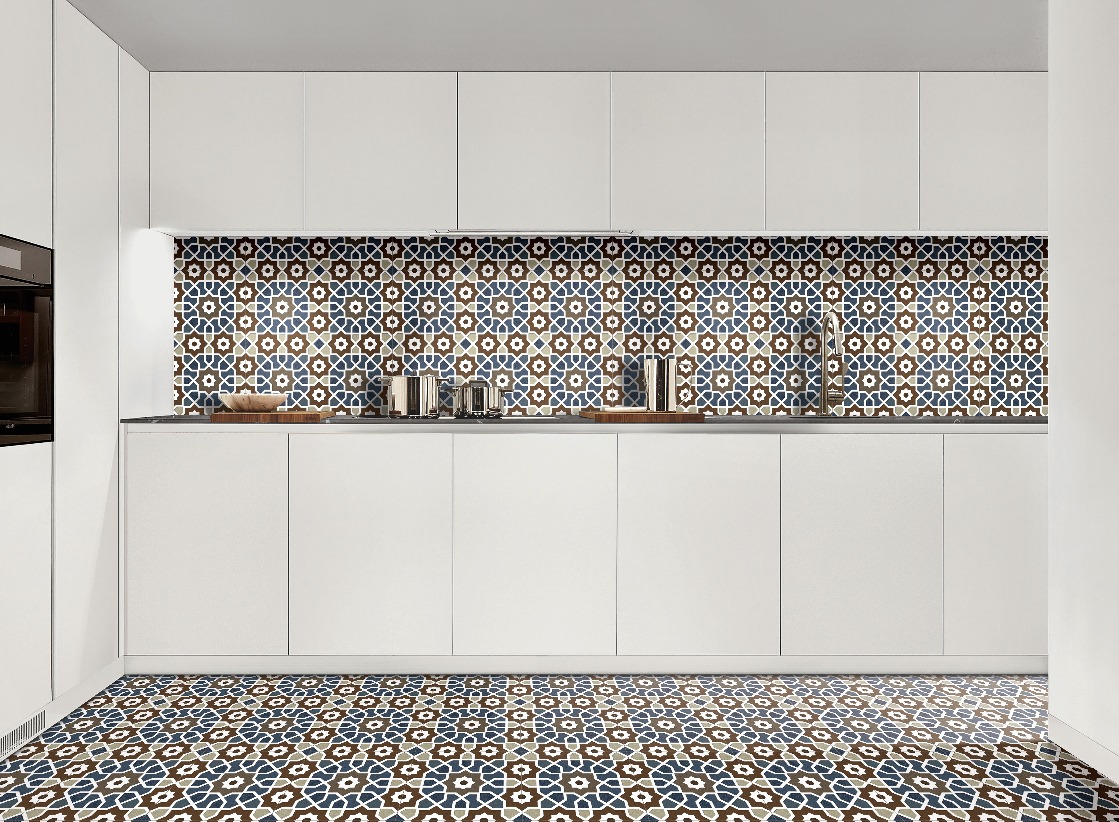 Geometric patterned tiles adorn the walls and floor, paired with sleek white cabinets
