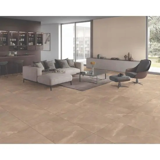 A spacious modern living room with beige tiled flooring, cozy furniture, and natural light