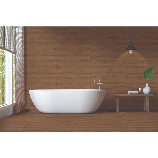 A chic bathroom with wooden-style tiles, a freestanding white tub, and gentle lighting